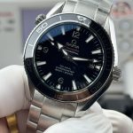 Date window at 3 o'clock cut into the black dial of the clone Omega Planet Ocean 600M