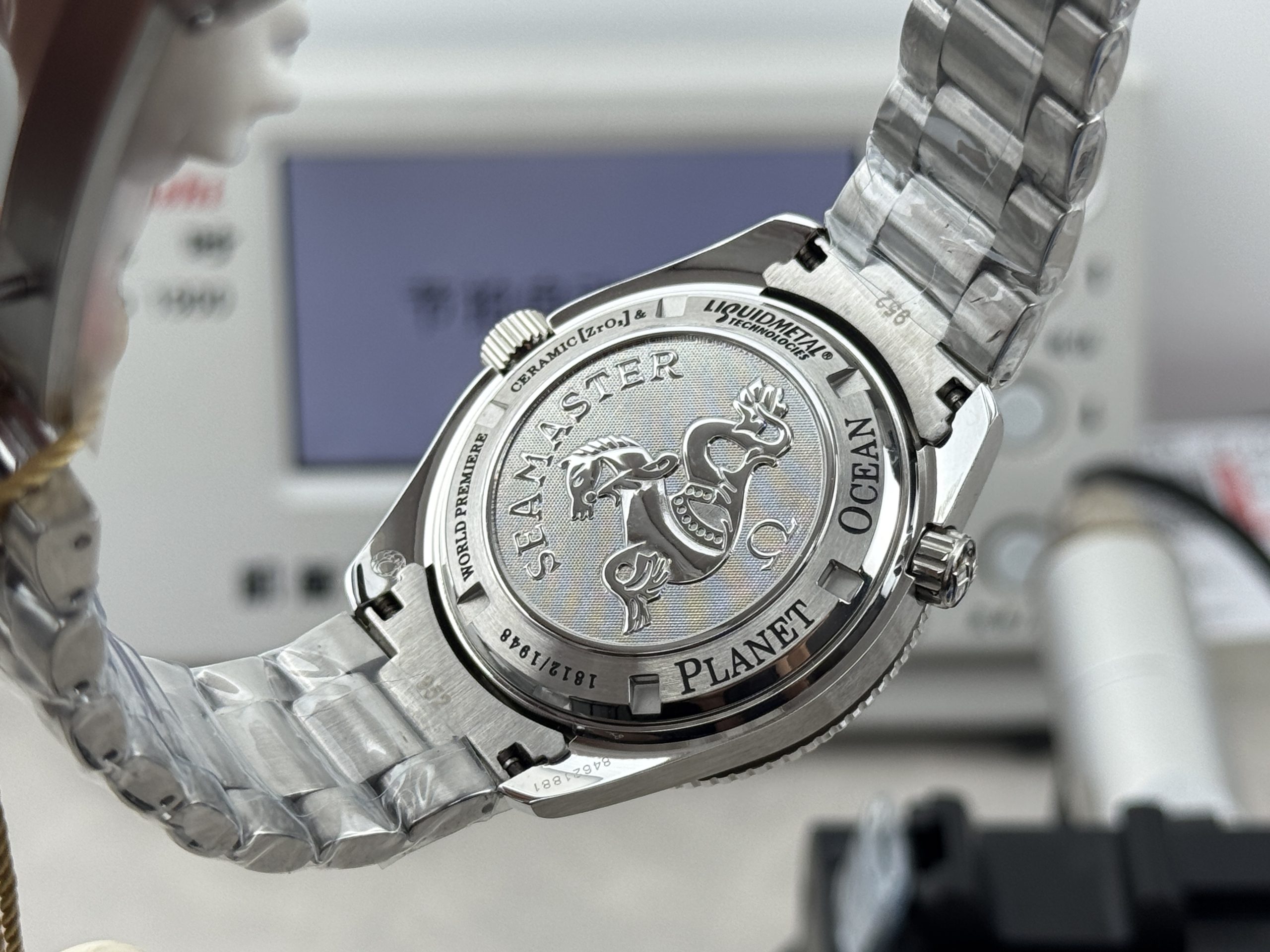 Steel bracelet with the diver extension folded into the clasp, superclone Omega Planet Ocean