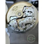 Luminous leaf-shaped hour and minute hands on the black Patek 5524G pilot dial