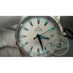 Blue hands sweeping across the bright white dial surface, 41.5mm Aqua Terra clone