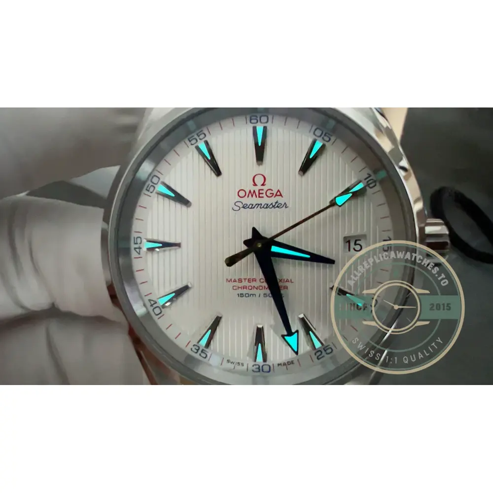 Blue hands sweeping across the bright white dial surface, 41.5mm Aqua Terra clone