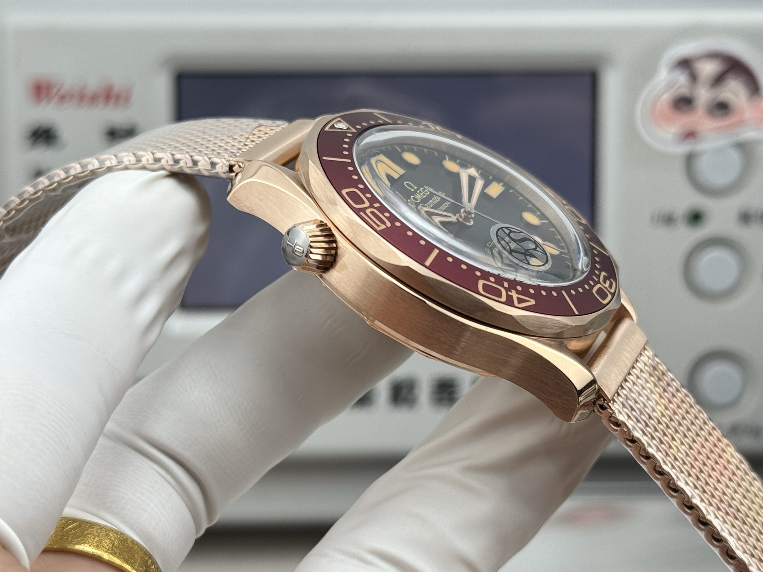 Case and bezel share one tonal register on this clone Omega Seamaster, which steel cannot match