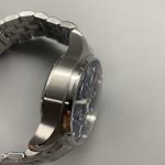 The day-date complication at three, dropped by the later 41mm chronographs