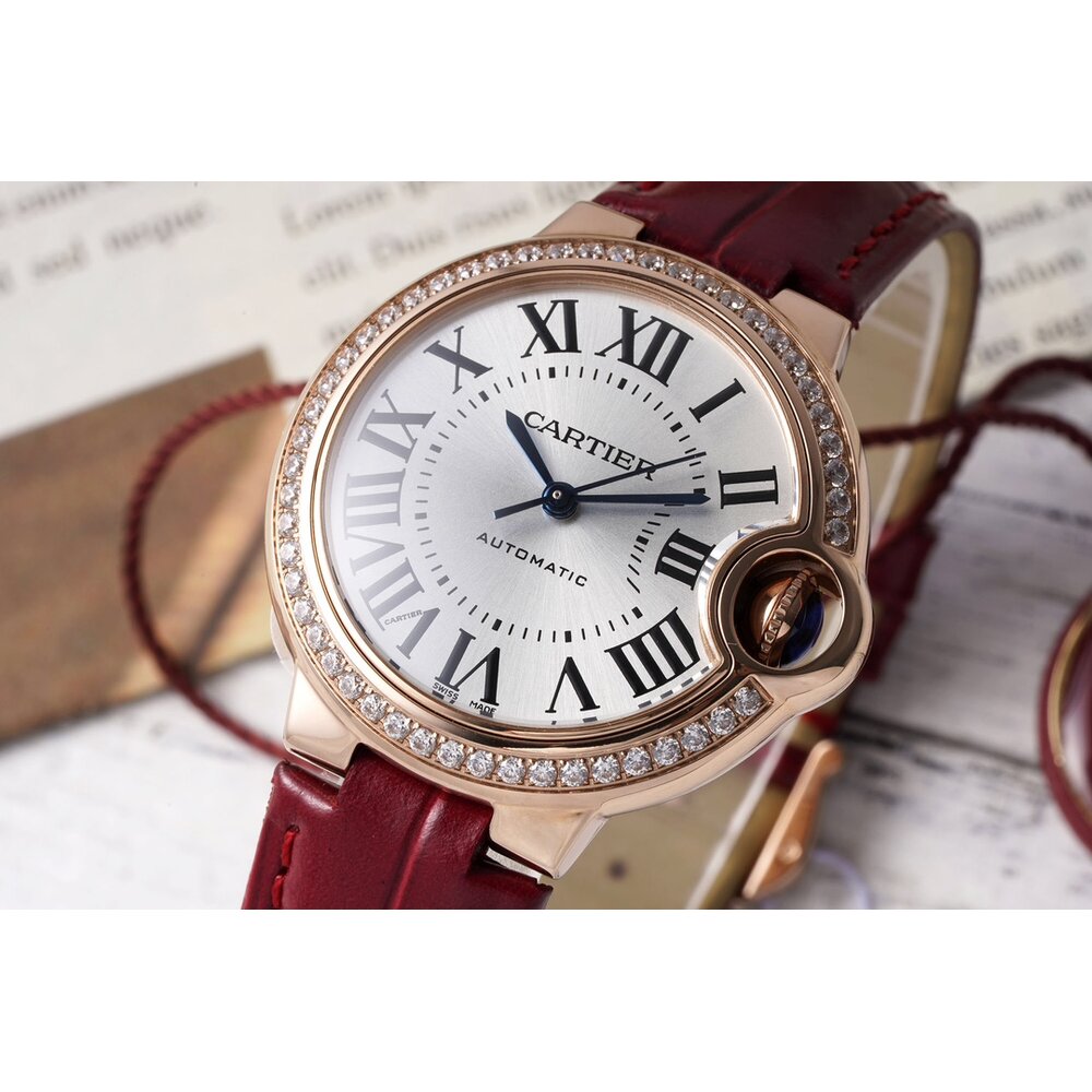 Inside the ring of Roman numerals runs a guilloche inner circle