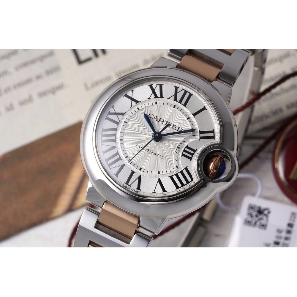 Blued sword-shaped hands stay readable on the silver dial even in weak light