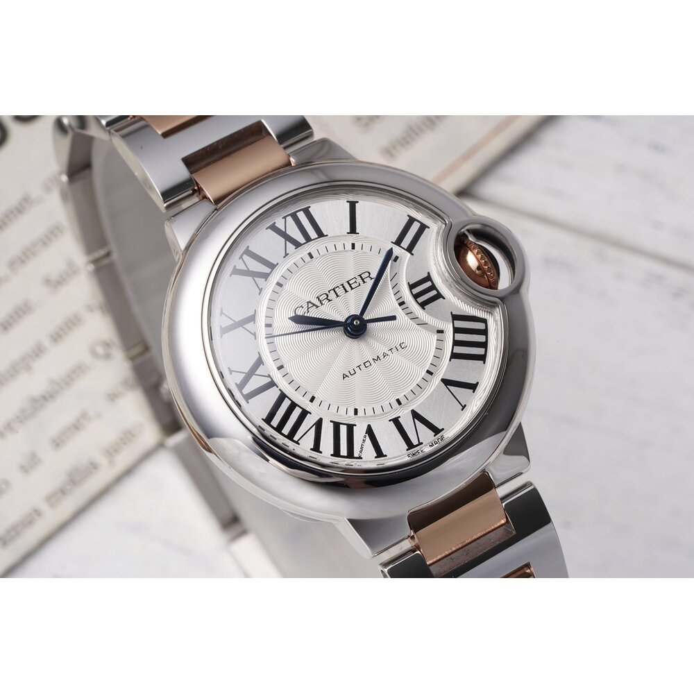 Set into the crown guard, the blue synthetic spinel sits flush with the case curve
