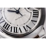 A date aperture at 3 o'clock, half behind the crown guard, with no magnification lens
