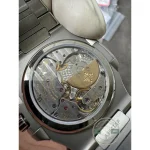 Small seconds subdial near 5 o'clock balancing the asymmetric layout of the steel Nautilus 5712