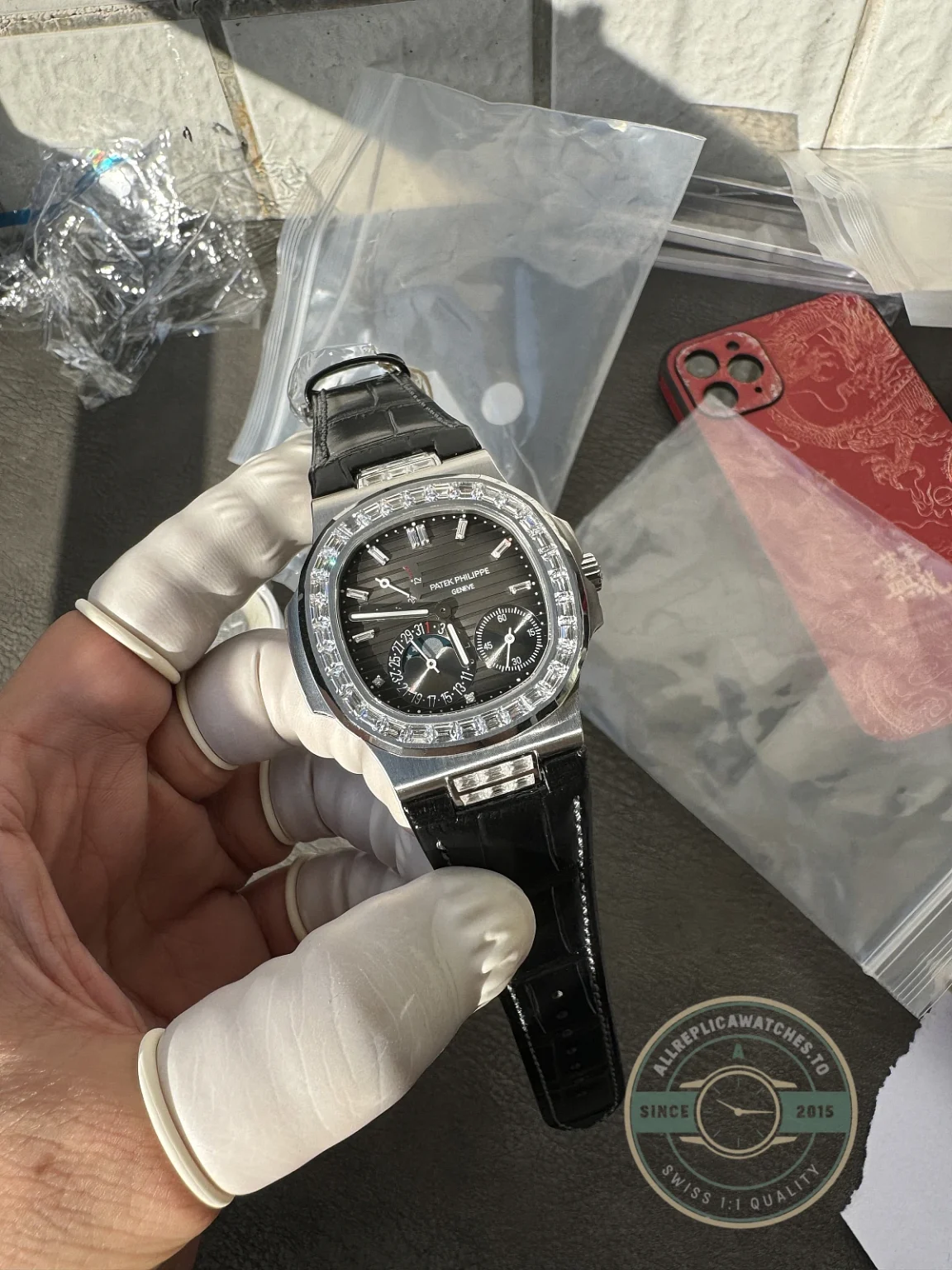 Replica Nautilus 5712G-001 Patek Philippe Moon phases. 40 mm, Baguette Bezel, White gold, Dark Blue Dial