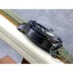Small seconds at nine and 12-hour counter at six in tone-on-tone green
