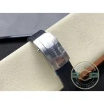 Applied luminous batons and square-tipped minute hand on the black dial