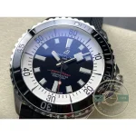 Polished 42 mm stainless steel case with grooved crown at three o'clock