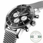 Three silver-white chronograph subdials at 3, 6 and 9 on a black Heritage dial