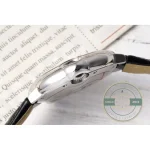 Painted Roman numerals over silver guilloche that radiates out beneath the crystal