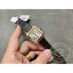 Small-in-hand shot giving the scale of the slim rectangular Dumont case