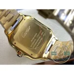 Reverse in gold tone, every specification line engraved in flowing script