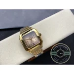 Whole watch set back on the cushion, full gold bracelet closed in a loop