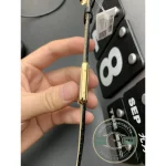 Case tilted away with the tag still attached at the strap's free end