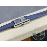 Crown side in profile, blue stone level with the stone-set edge