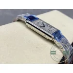 Crown side profile, the blue stone sitting between two rows of diamonds