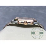 Luminous baton hands and centre seconds over the dial of the two-tone Cubitus 5821/1AR-001 with blue dial