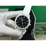 White luminescence on blackened hands, the only bright element on the dial