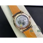 The moon phase at twelve gives the white perpetual dial its classical close