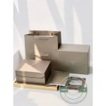 Presentation box opened to show the cushion and the lining that seats the watch