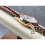 Month and year register at six o'clock and the moon phase at twelve on the white dial