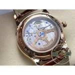 Side profile of the 39mm pink gold case showing how flat it sits under a cuff