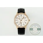 Full watch upright on grey, showing the strap taper down to the pink gold buckle