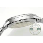 Opposite case profile, bracelet flowing away, caseback edge catching the light