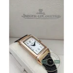 Reverso super clone caught mid-flip as the case slides along its cradle rails