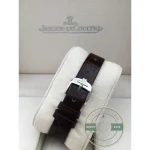 Crown side of the JLC Reverso replica, polished stainless steel flank and cradle pivot point