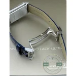 Winding crown at the narrow end of the rectangular steel case instead of the usual three o'clock