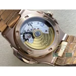Rose gold tone hands and applied batons on the silver-white Nautilus calendar dial