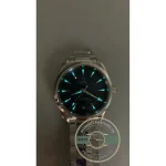 Slim steel case profile that slides under a cuff, Aqua Terra superclone at 41mm