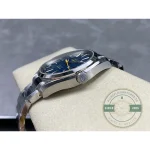 Date window at three o'clock in the traditional position, Aqua Terra clone dial
