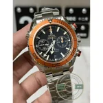 Chronograph pushers at 2 and 4 o'clock on the clone Omega Seamaster 600M, case flank lit
