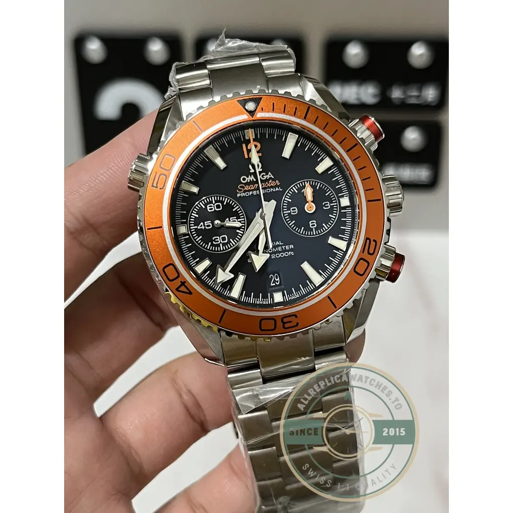 Chronograph pushers at 2 and 4 o'clock on the clone Omega Seamaster 600M, case flank lit