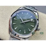 Olive turning grey-green in dim light and true olive in daylight on this Omega replica