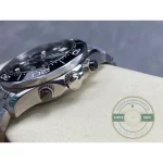 Polished hands and applied indices doing the work on an all-black dial, super clone Omega Seamaster