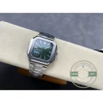 Luminous baton hands and a slim centre seconds hand on the steel Cubitus 5821 with emerald green dial