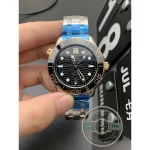 Steel and sedna gold bracelet of the replica Omega Seamaster Diver 300M with its adjustable clasp
