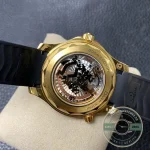 Wave-pattern texture across the black dial of this gold-plated Seamaster replica