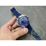 Warm Sedna gold tones read against the cool blue dial of this replica Diver 300M