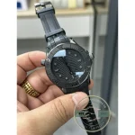 Wave-pattern dial with applied indices filling the 44mm superclone case