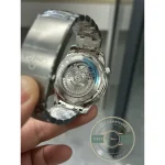 Liquid metal diving scale set into the black ceramic bezel, Seamaster clone