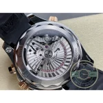 Gold hands and indices lifting off the black dial of the superclone Omega Seamaster chronograph