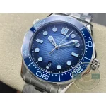 Blue ceramic catching light at a shifting angle across the wave motif, clone Omega Diver 300M